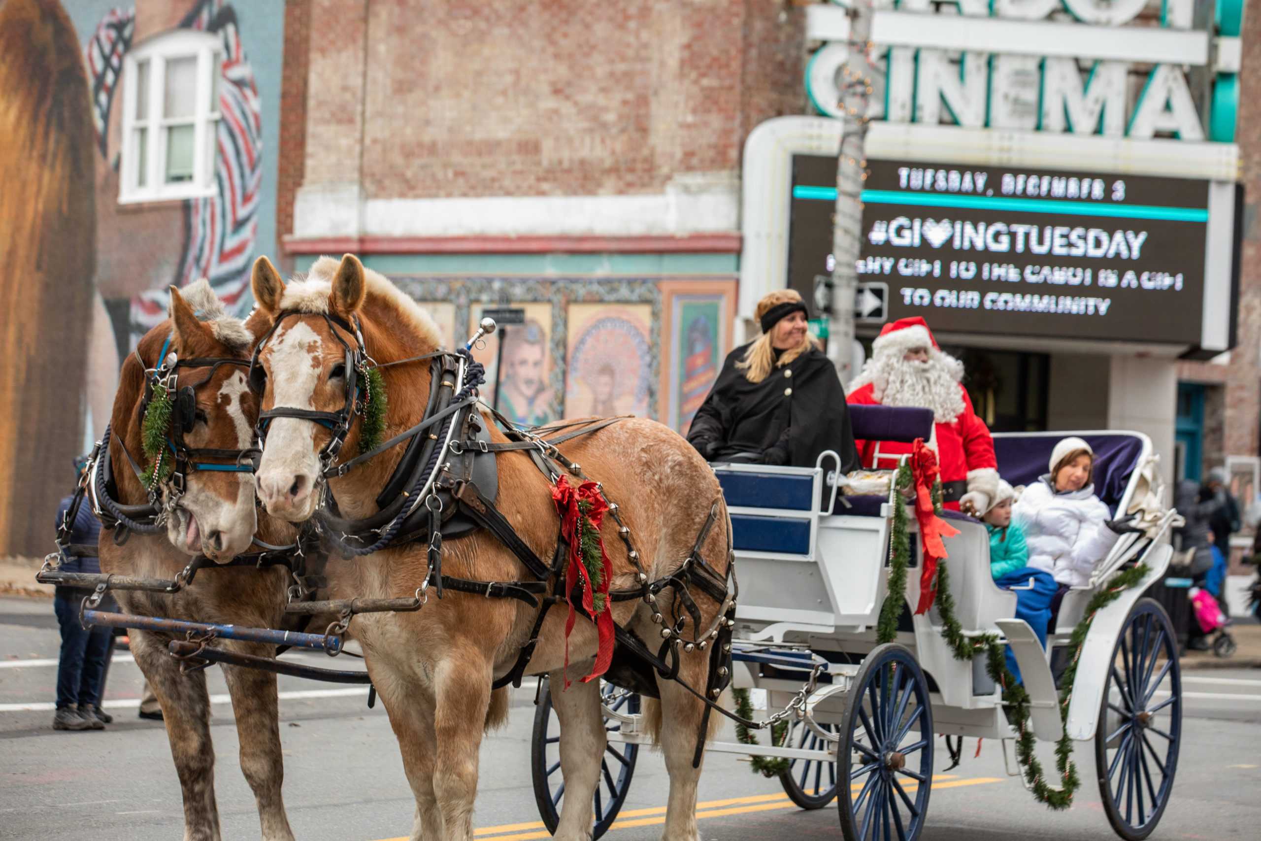 Santa in horse drawn wagon in Beverly Ma