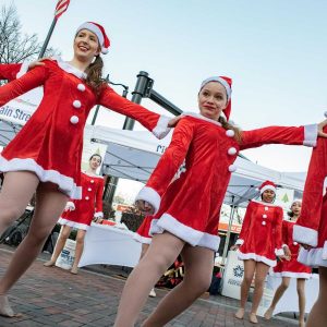 Female dancers from zello dance in holiday outfits