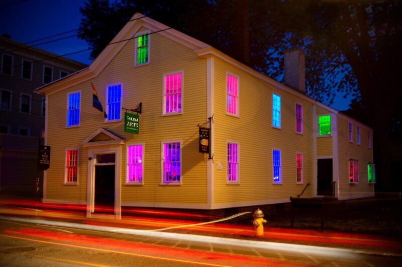 A house with colorful lights on it.