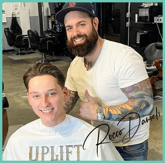 a man getting his hair cut by a barber.