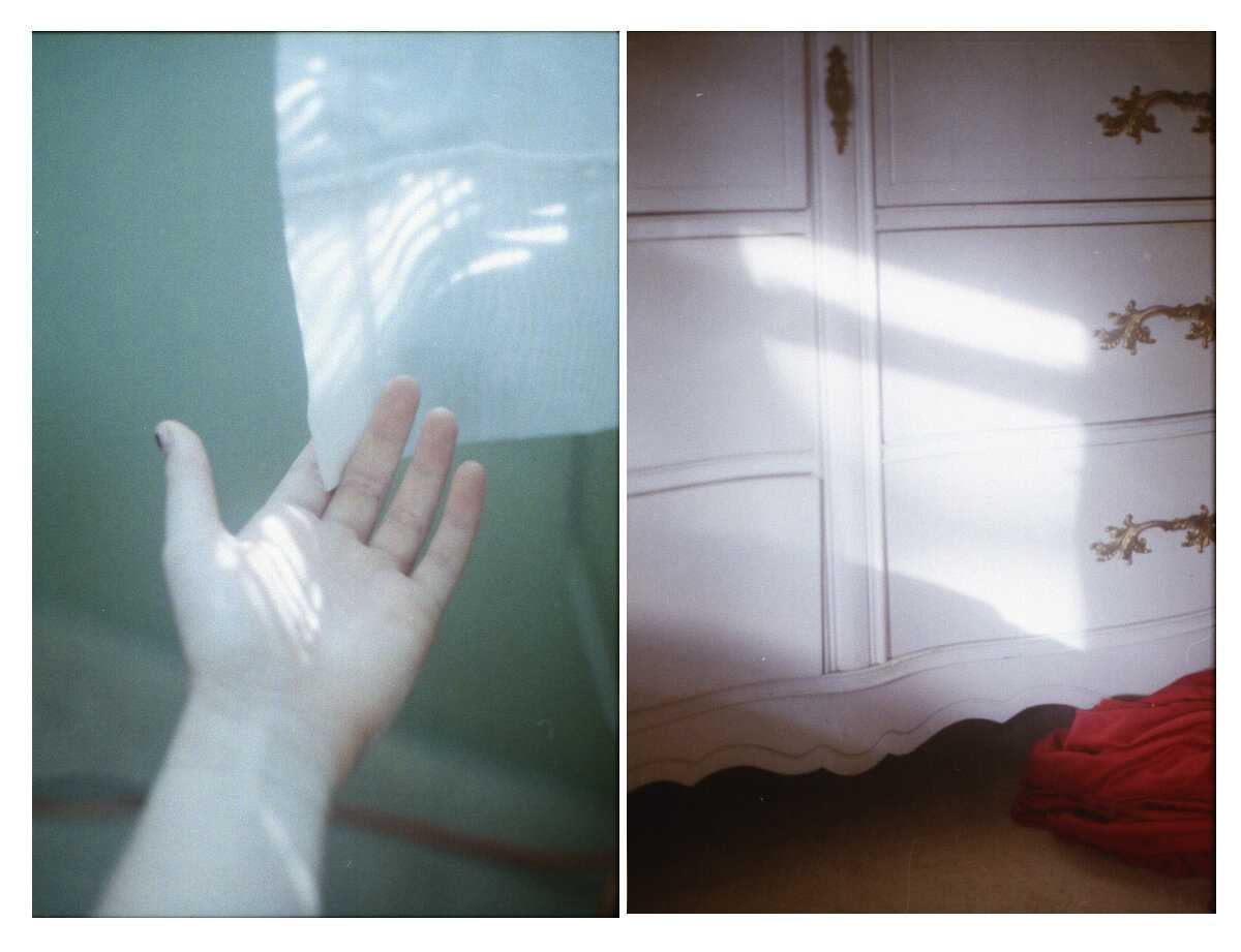 a person's hand on a dresser next to a picture of a person '.