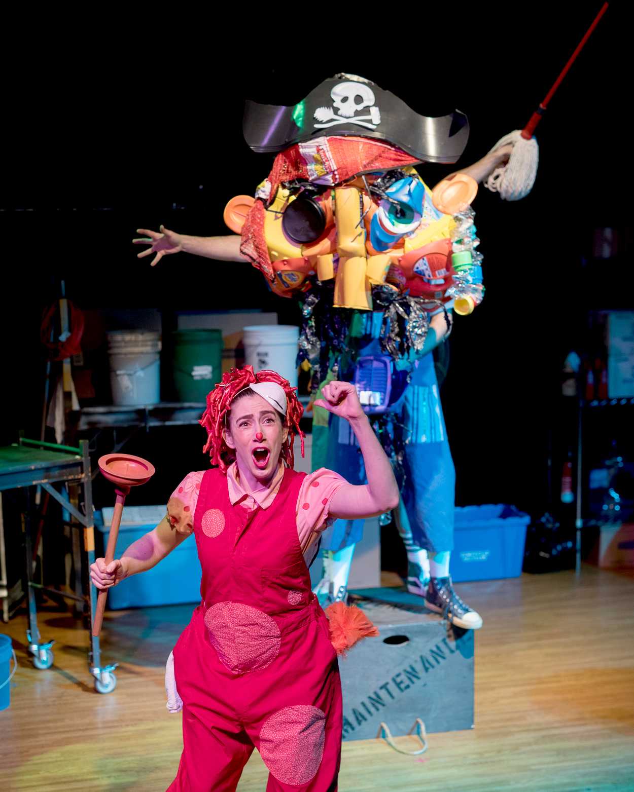 a person in a costume on a stage.