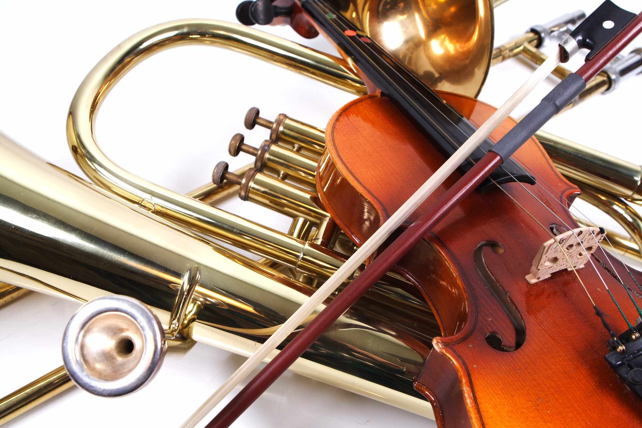 a close up of a violin and other musical instruments.