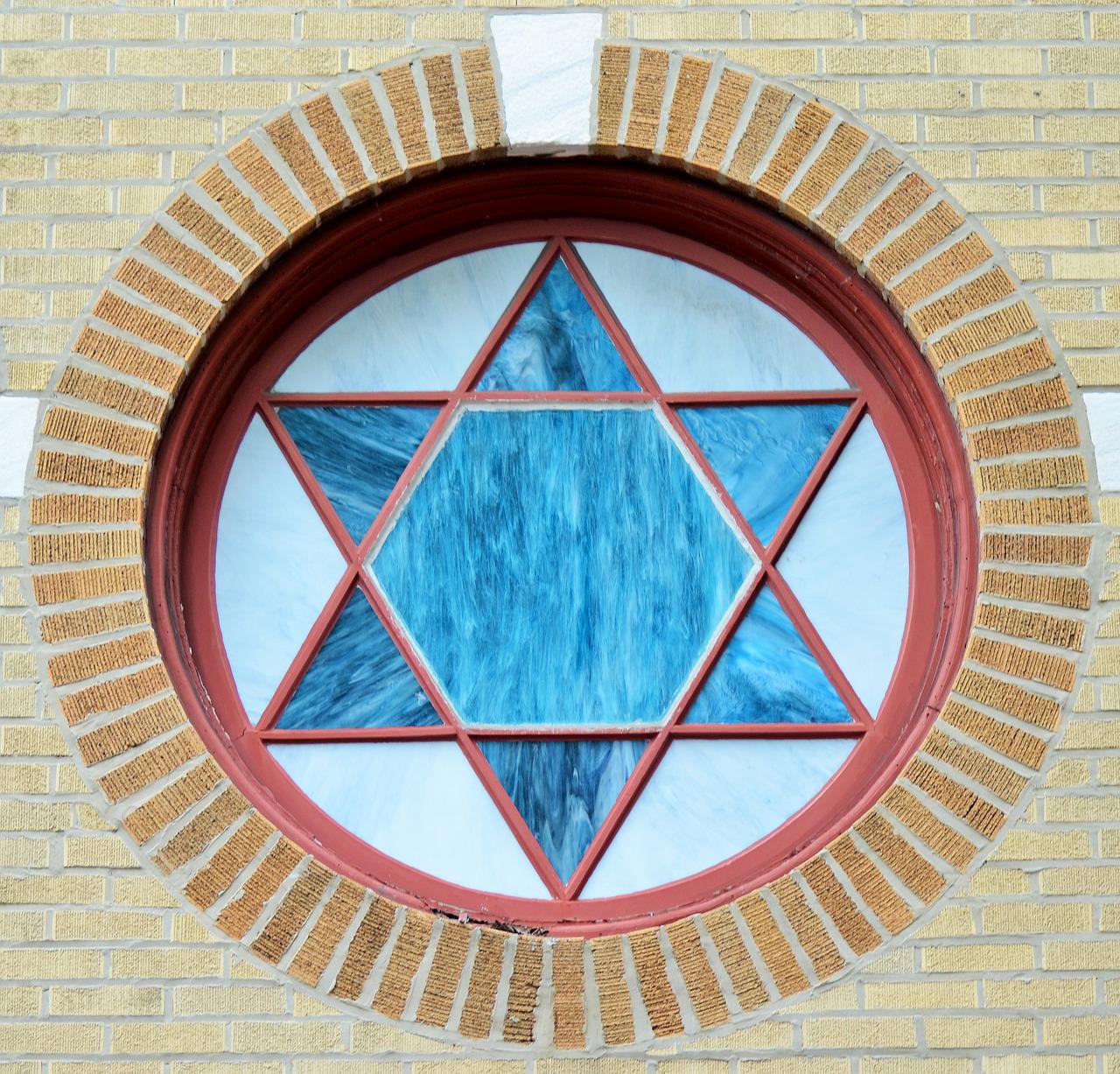 a circular window with a star of david on it.