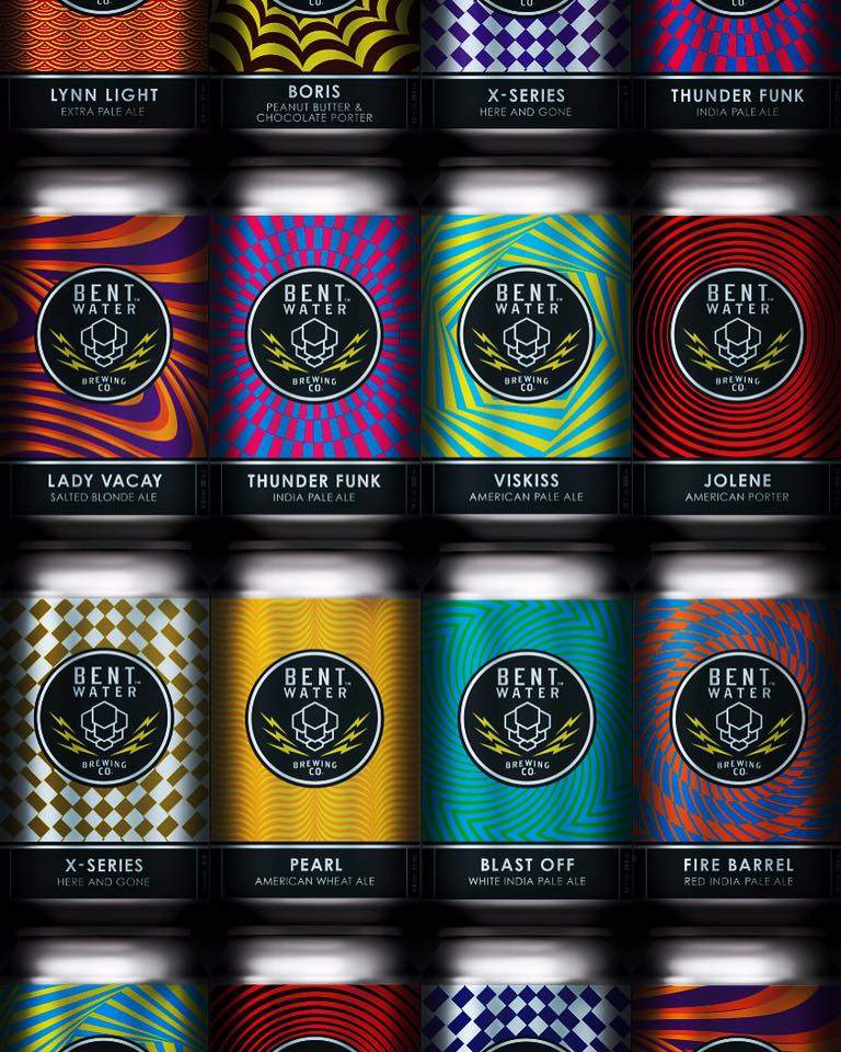 a group of cans of beer with different colors.