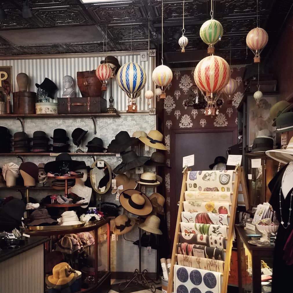 a room filled with lots of hats and hats.