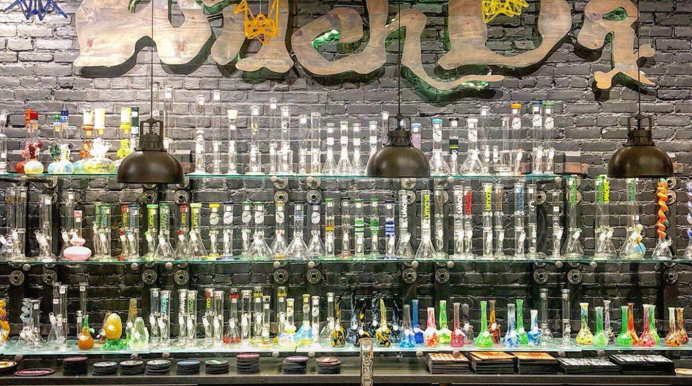 a display case filled with lots of bottles.