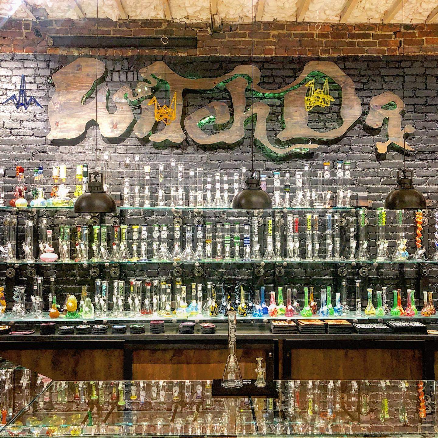 a display case filled with lots of bottles.