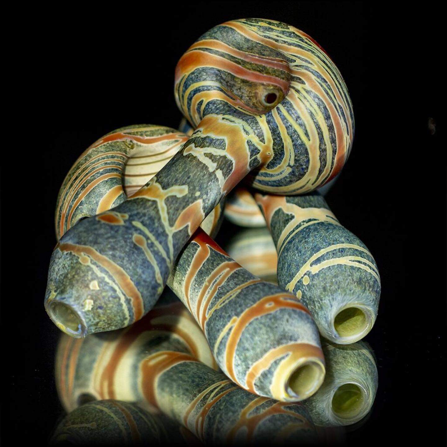 a group of marbles sitting on top of each other.