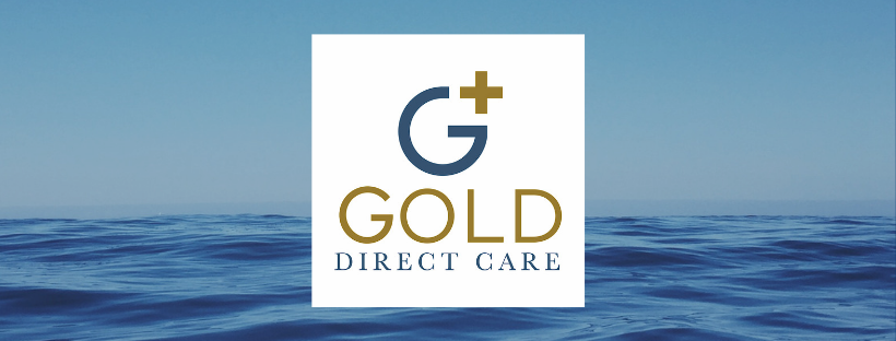 gold direct care logo against an ocean background