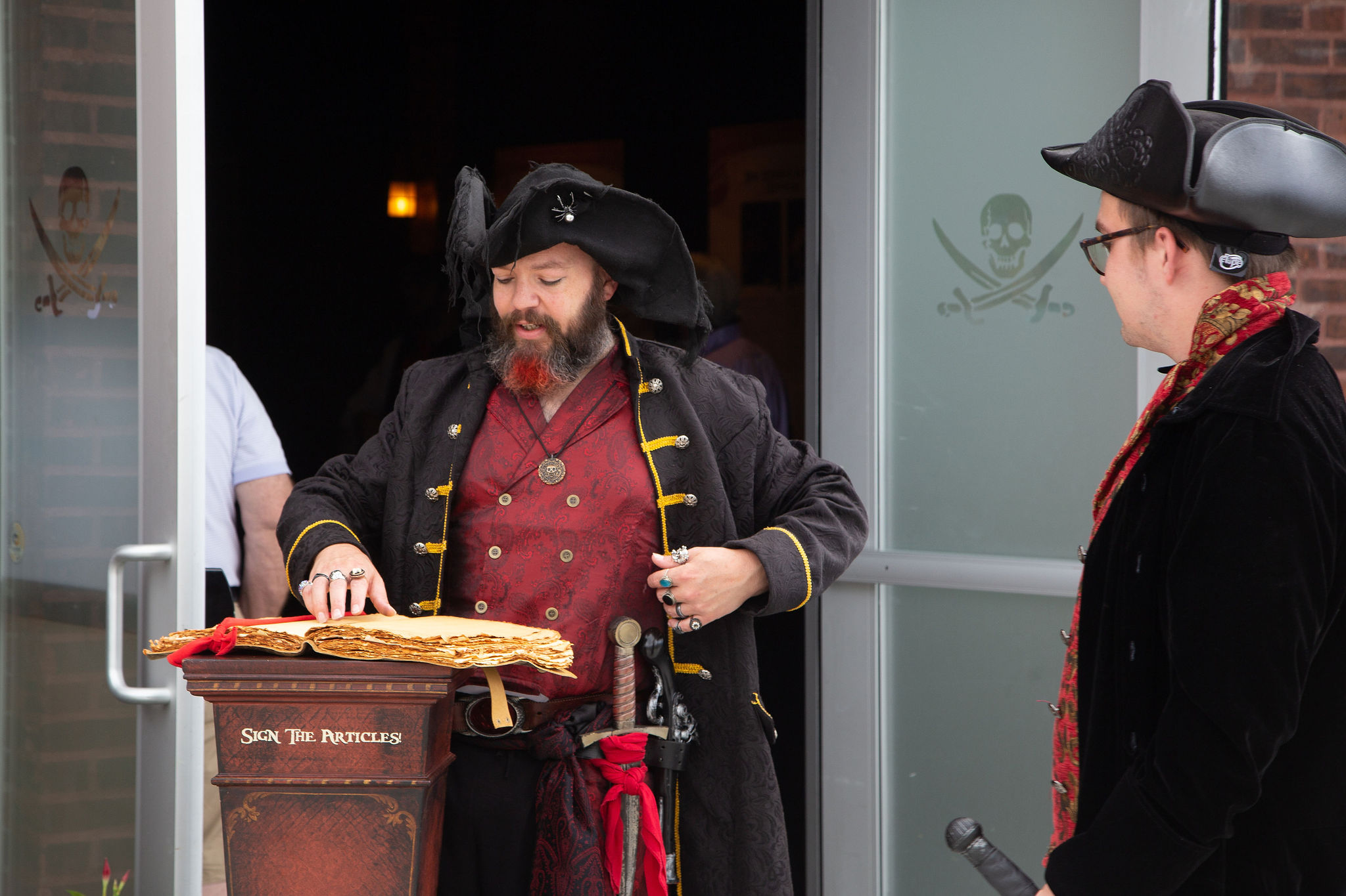 A pirate performer stands outside of real pirates Salem