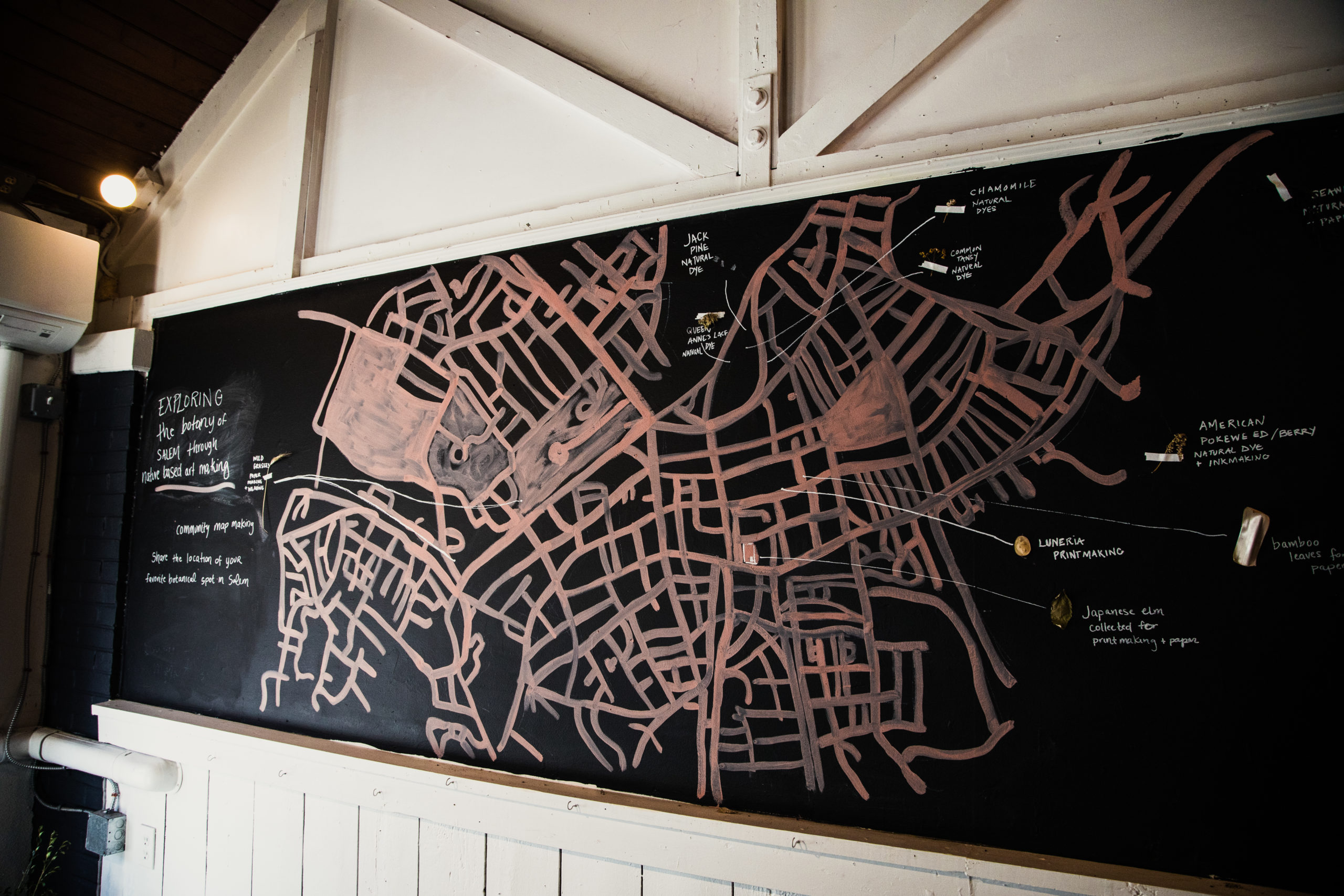 a map of a city on a wall.
