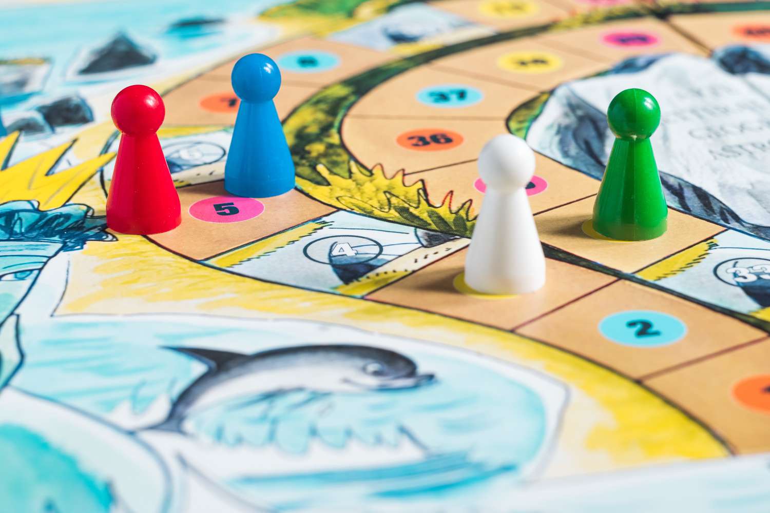 a close up of a board game with people on it.