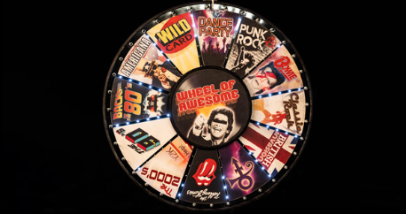 a wheel of fortune with a lot of stickers on it.