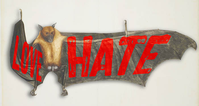 A bat holding a sign that says live hate.