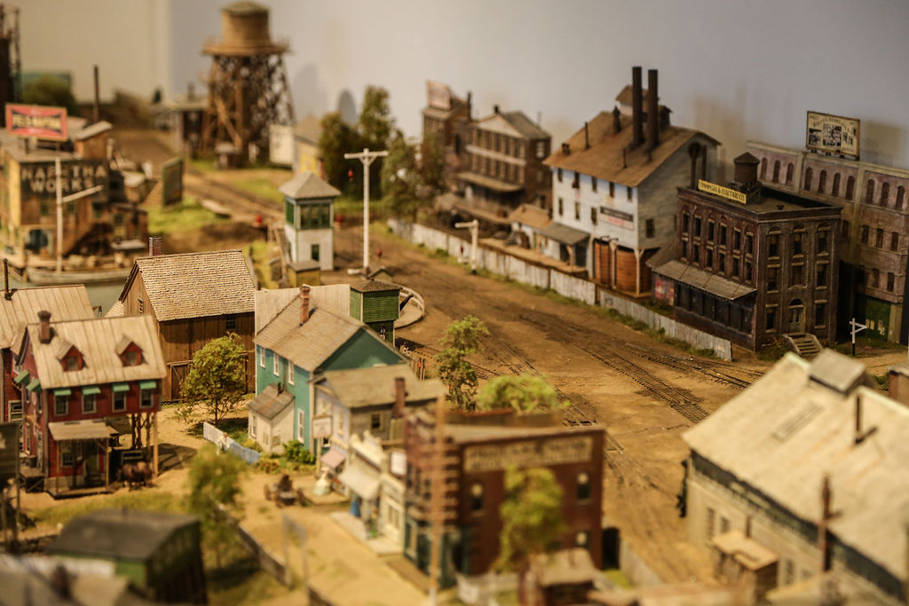 A model of a town is displayed in a museum.