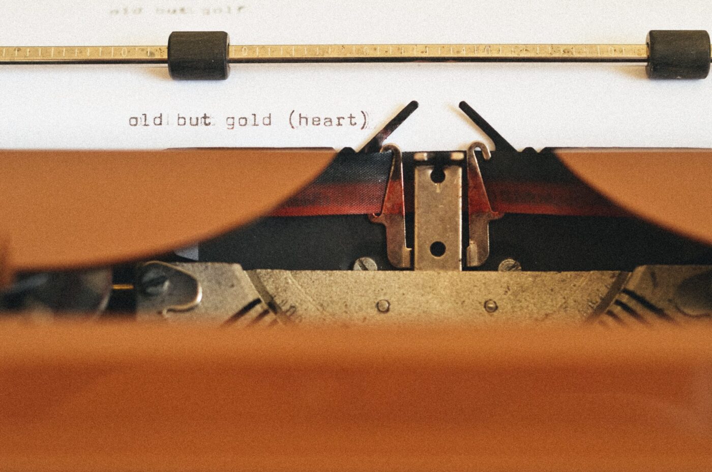 An old typewriter with a piece of paper on it.