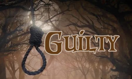 The title of guilt with a rope hanging in the woods.