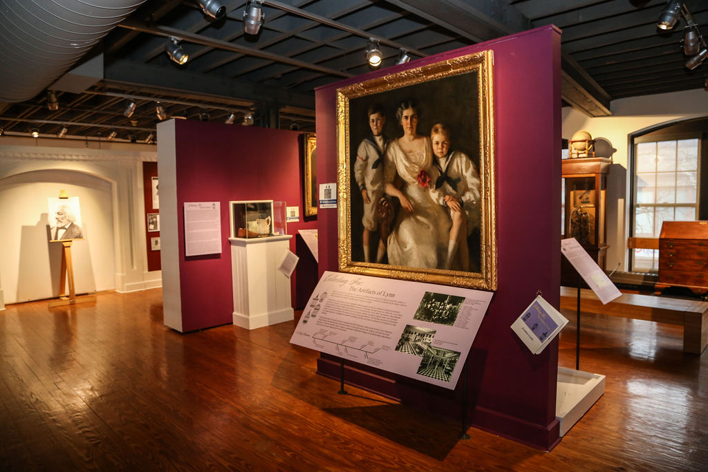A museum with a painting on display.