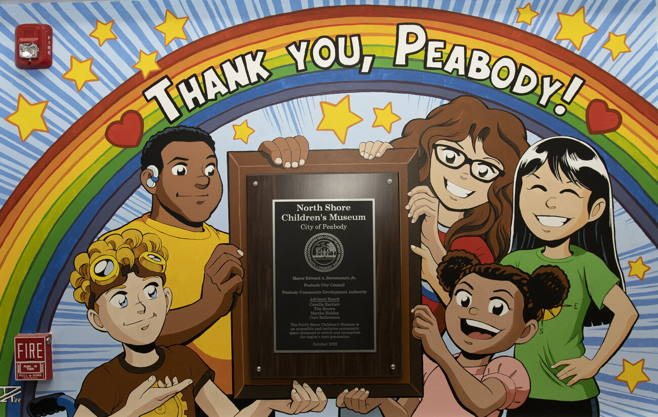 A mural of children holding a plaque that says thank you peabody.