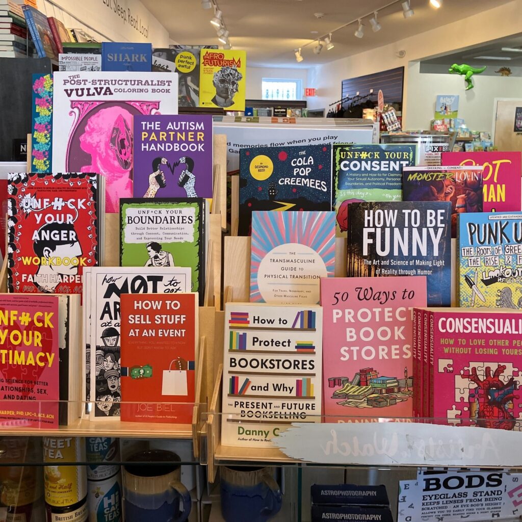 A curated collection of books on display in a store to celebrate Small Business Saturday.