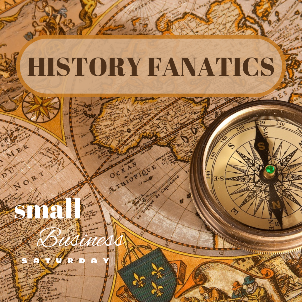 A compass on a map with the words small business history fanatics.