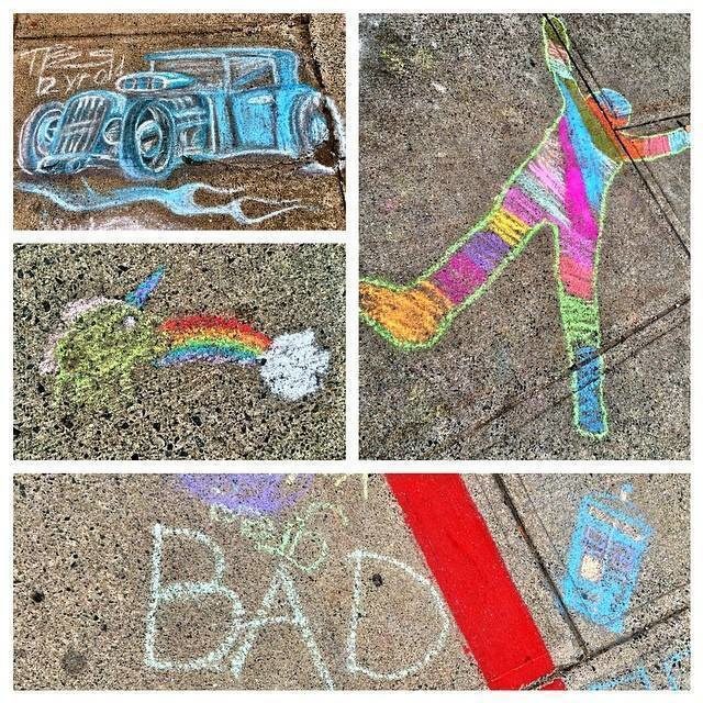 An artistic assortment of chalk illustrations adorning the pavement.