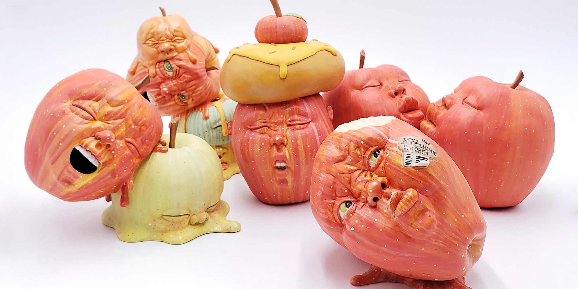 An ensemble of intricately carved pumpkins, each boasting a distinctive face.