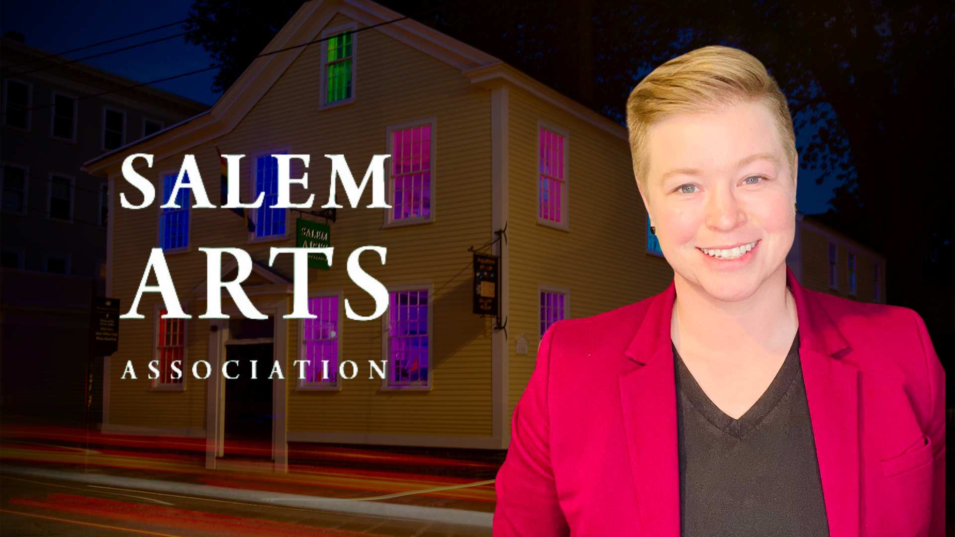A woman poses by a home prominently displaying the "Salem Arts Association" sign.
