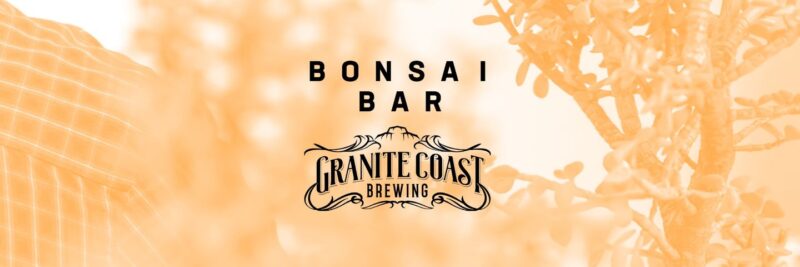 Check out the unique emblem of Granite Coast Brewing's Bonsai Bar. It features artistic tree outlines, set against a captivating amber background.