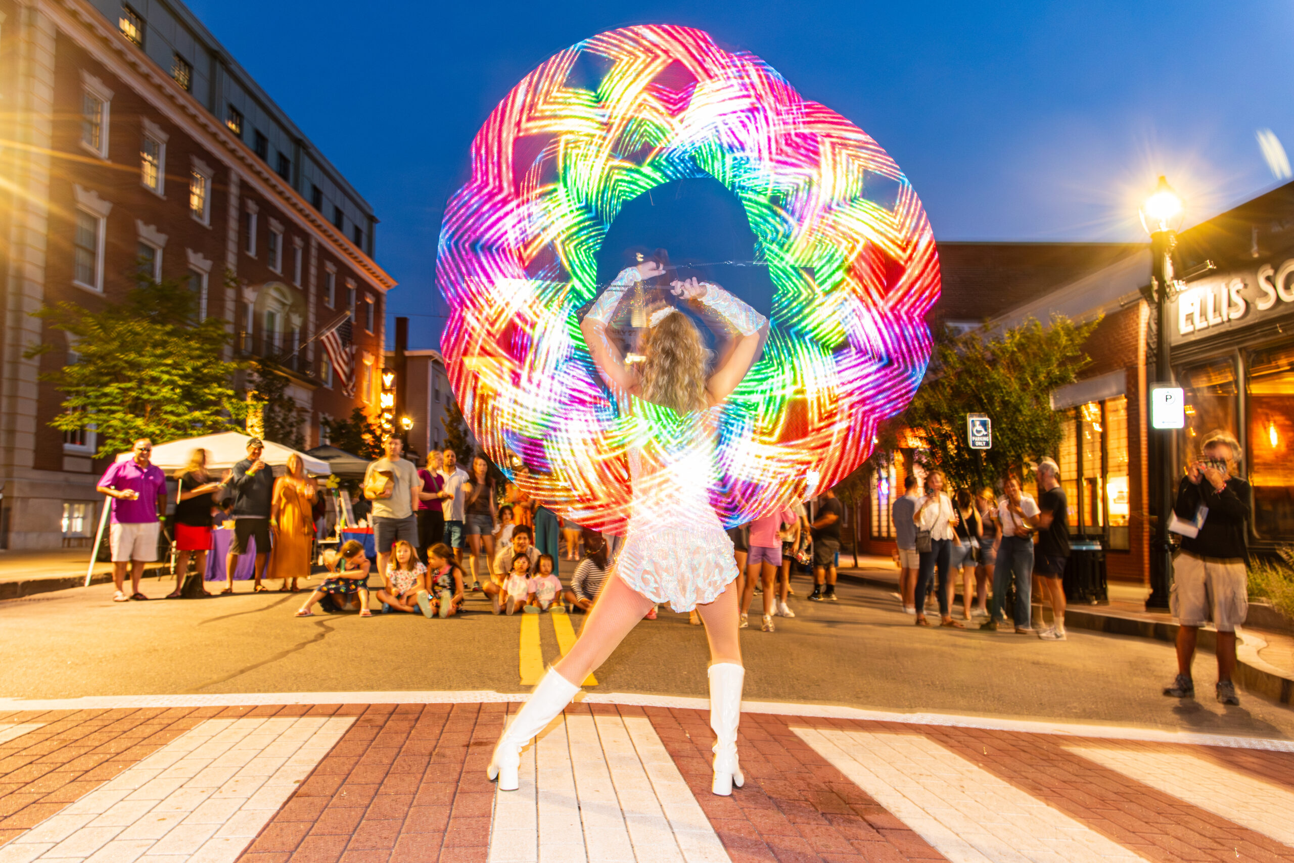 Woman in street with LED performance gear long exposure