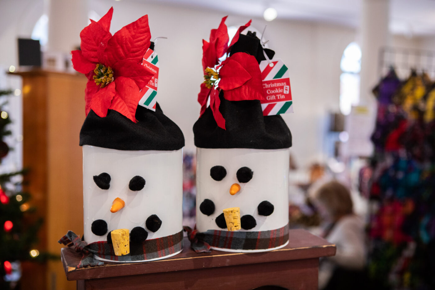 Festive snowman tins from North Shore Creative Collective showcase local flair—spreading Essex County holiday joy and creativity indoors.
