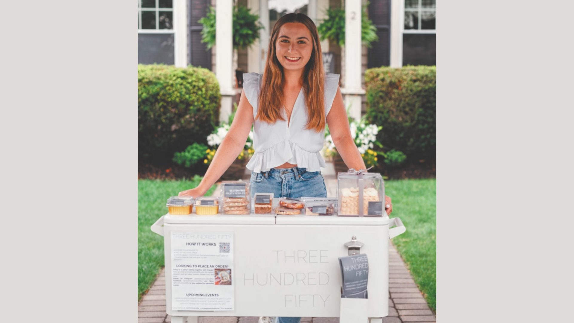 A woman showcasing her delicious baked goods, labeled "Three Hundred Fifty," sets up outside her home. She's part of the Meet the Member: Salem Film Fest initiative, dedicated to raising funds for captivating film experiences.