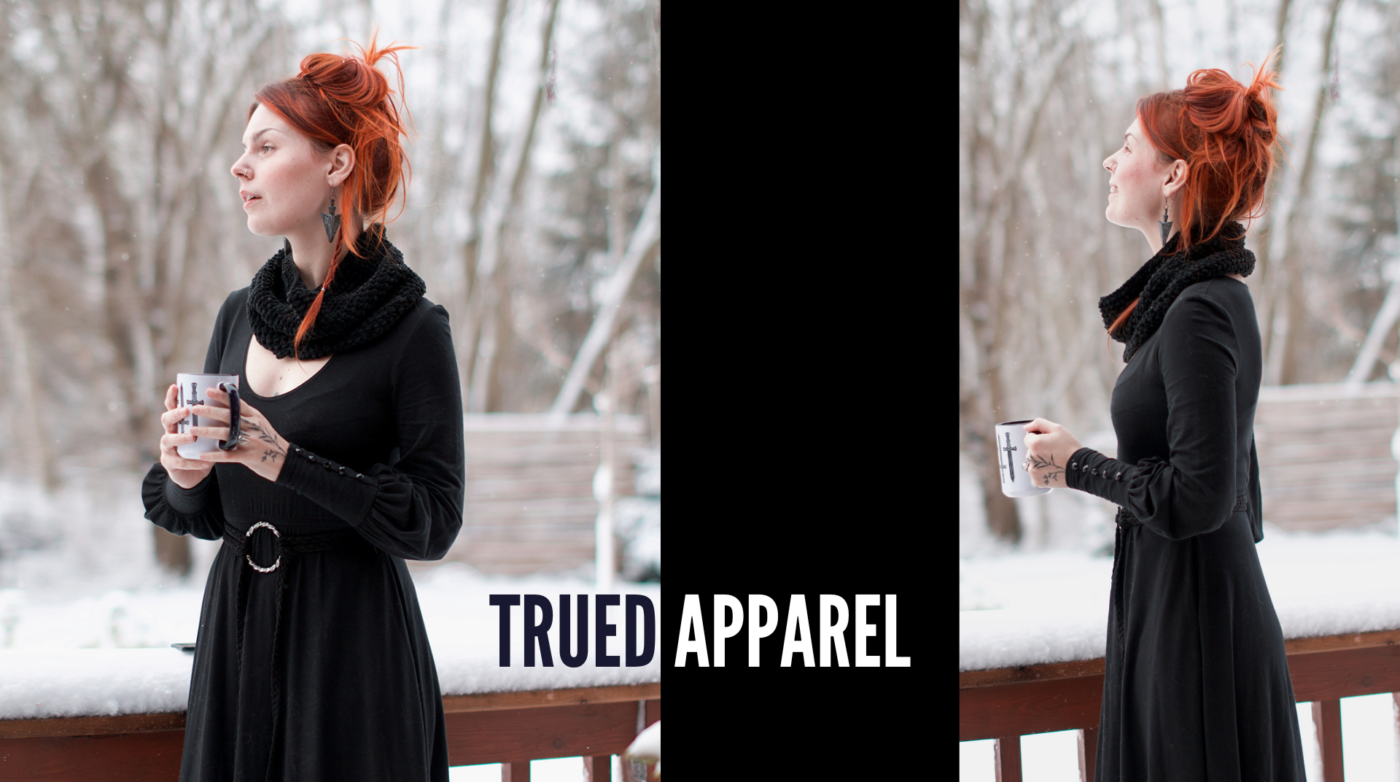 Red-haired person in a sleek black dress, enjoying a snowy day on the deck with a cozy mug. Text at the center: "TRUED APPAREL".