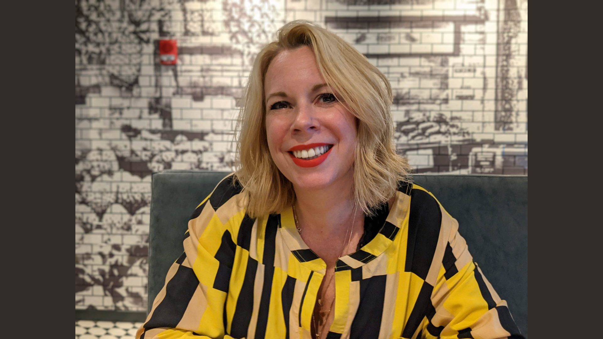 Meet the Member: Excelsior Professional Coaching Get to know one of our standout members: Excelsior Professional Coaching. In this feature, we spotlight a friendly face—one of their coaches, known for her warm smile and approachable style. She’s pictured sitting at a table in a yellow, black, and beige striped blouse, with a unique black-and-white tile mural as her backdrop. Her professional yet relaxed presence makes it easy for clients to connect with her and feel understood. Discover how Excelsior Professional Coaching helps individuals achieve their career goals through tailored coaching strategies that make real results possible. Ready for your next step? Connect with Excelsior today to unlock your potential!.