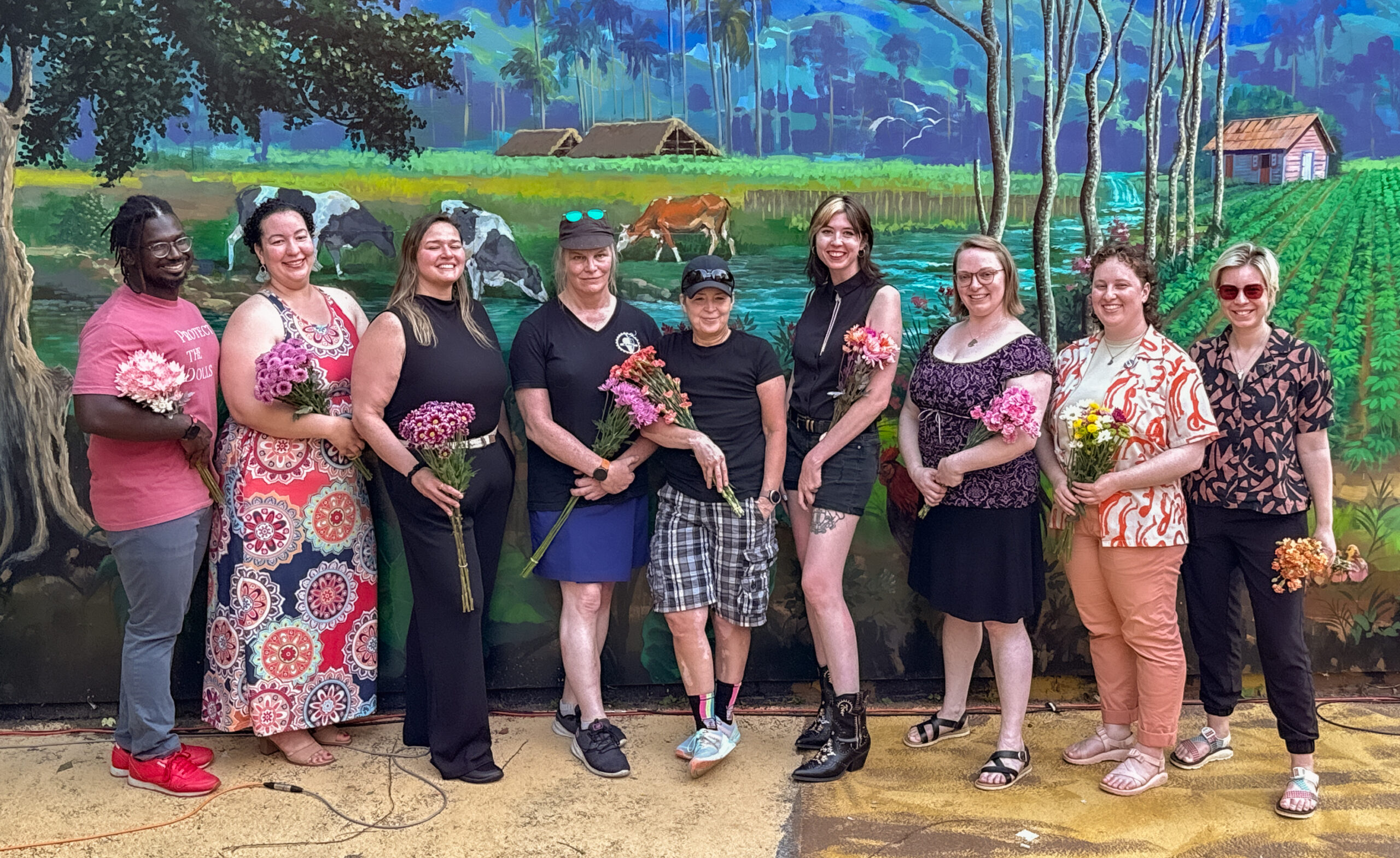 Seven North Shore LGBTQ business owners pose together after Queer Voices Panel discussion in Salem, featuring entrepreneurs from EnVision Productions, The Castle, Whimsy's, and other local businesses