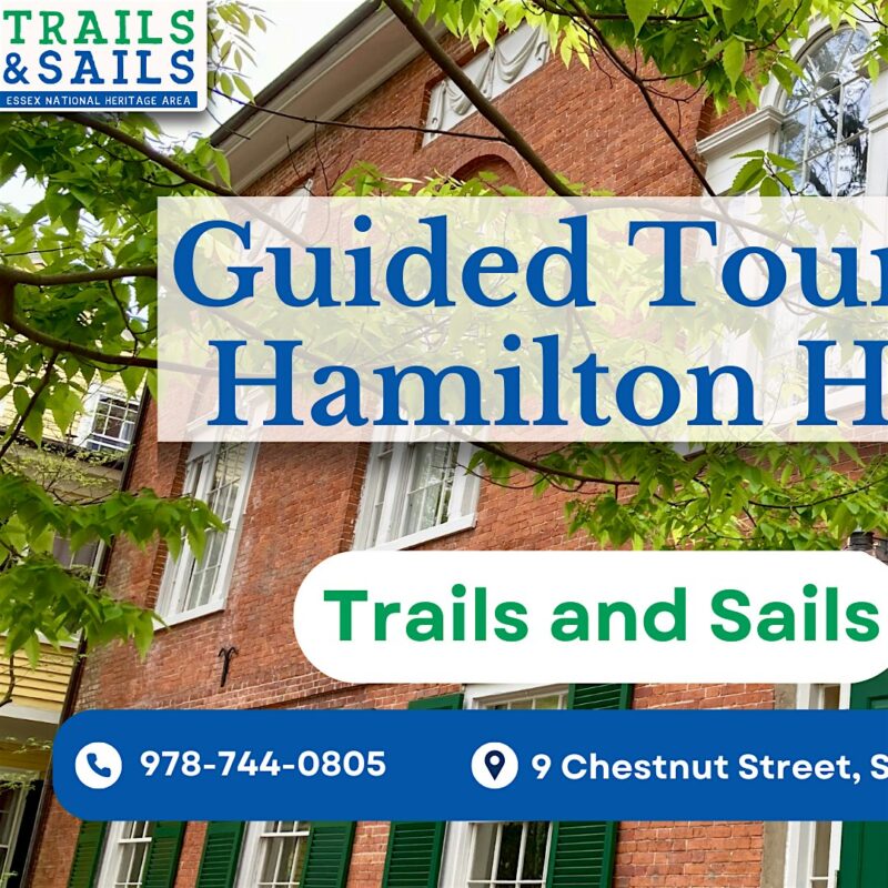 A lively brick building with white trim framed by leafy branches, promoting "Trails and Sails"—a creative Essex County community event.