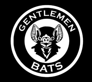 A bold black and white logo unites Essex County: a playful bat in a tuxedo links “GENTLEMEN” and “BATS,” celebrating vibrant community spirit.