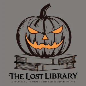 A glowing jack-o’-lantern with a mischievous grin crowns two books, spotlighting Salem’s Lost Library, a creative Essex County hub.