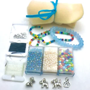 A colorful spread of beads, charms, clasps, and threads sparks Essex County creativity and community crafting connections.