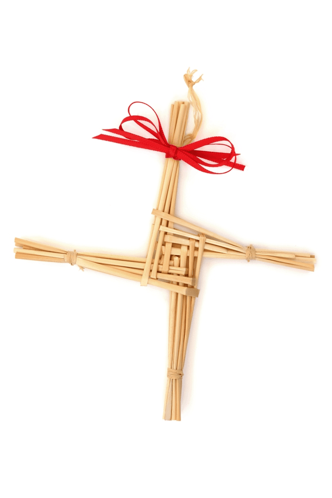 A lively St. Brigid’s cross from woven straw and a red ribbon, symbolizing Essex County unity, rests on a bright white background.