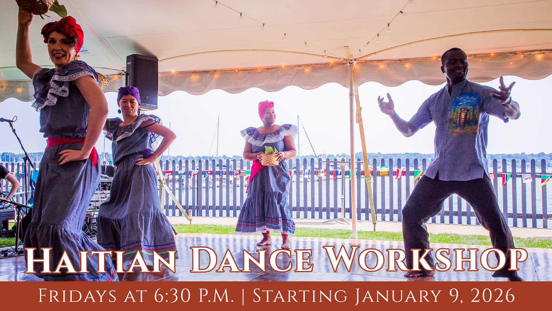 Four dancers in vibrant Haitian dress share lively moves on an outdoor Essex County stage, inviting all to connect at the workshop.
