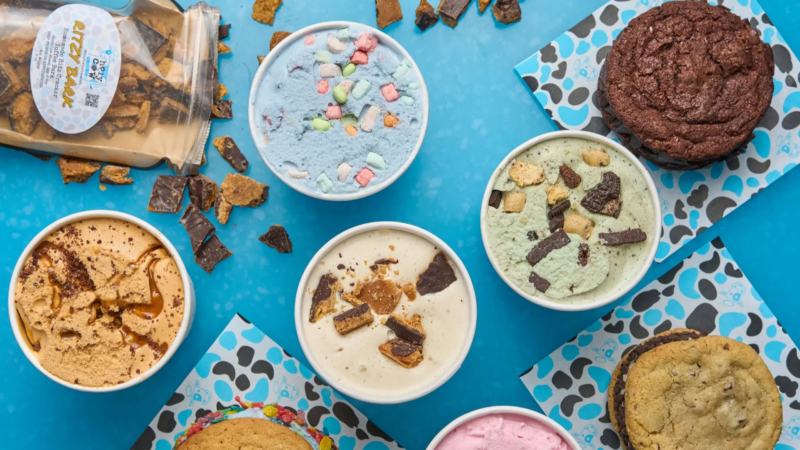 A lively spread of six colorful ice cream cups with fun toppings, cookies, and local brittle, inviting Essex County friends to share and celebrate.