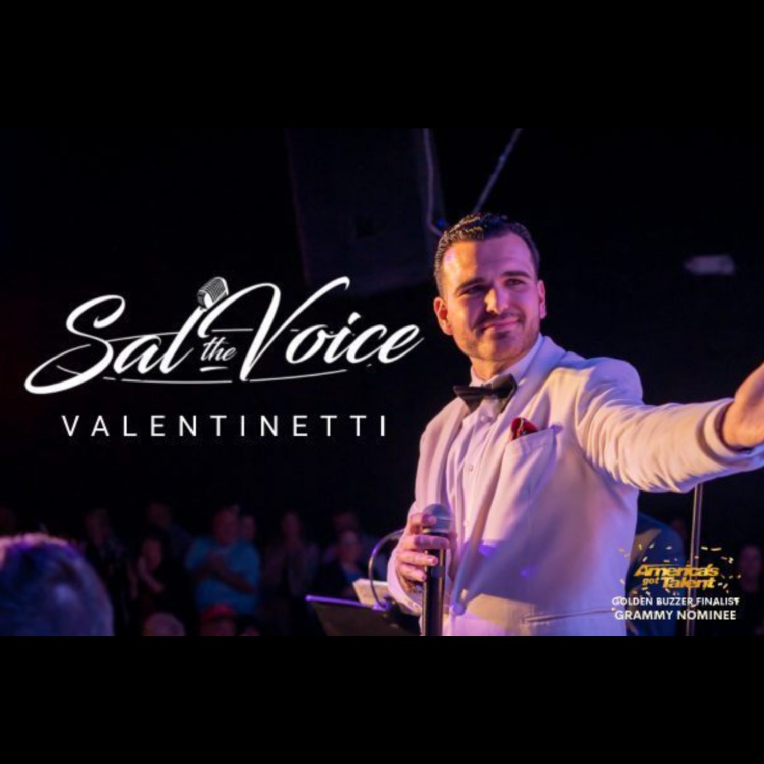 A lively performer in a white tuxedo energizes the stage, engaging an excited local crowd as “Sal the Voice Valentinetti” shines.