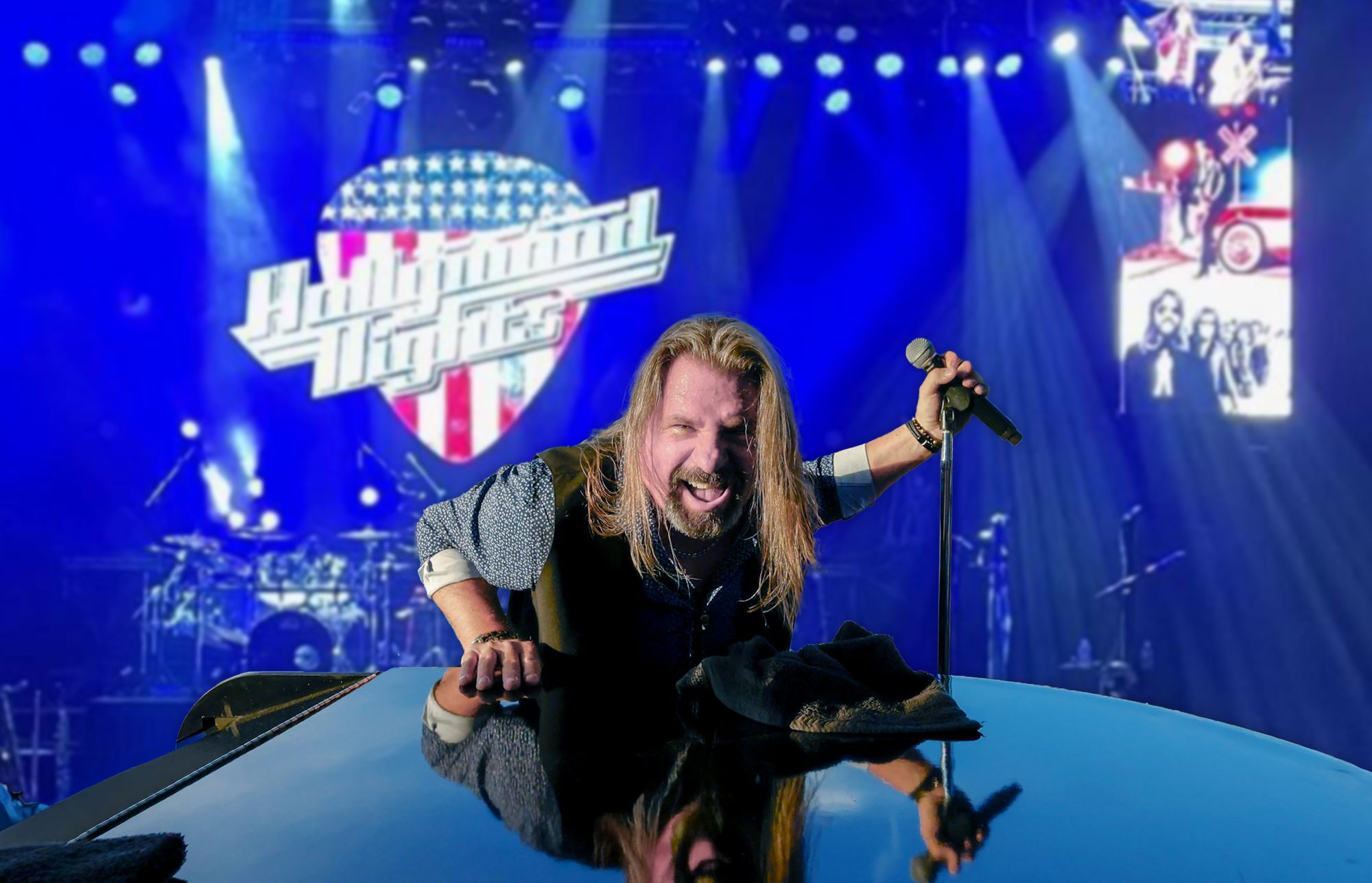 A dynamic rock singer with flowing blond hair energizes the crowd, uniting Essex County under blue lights and a bold flag-lit "Hollywood Nights" sign.