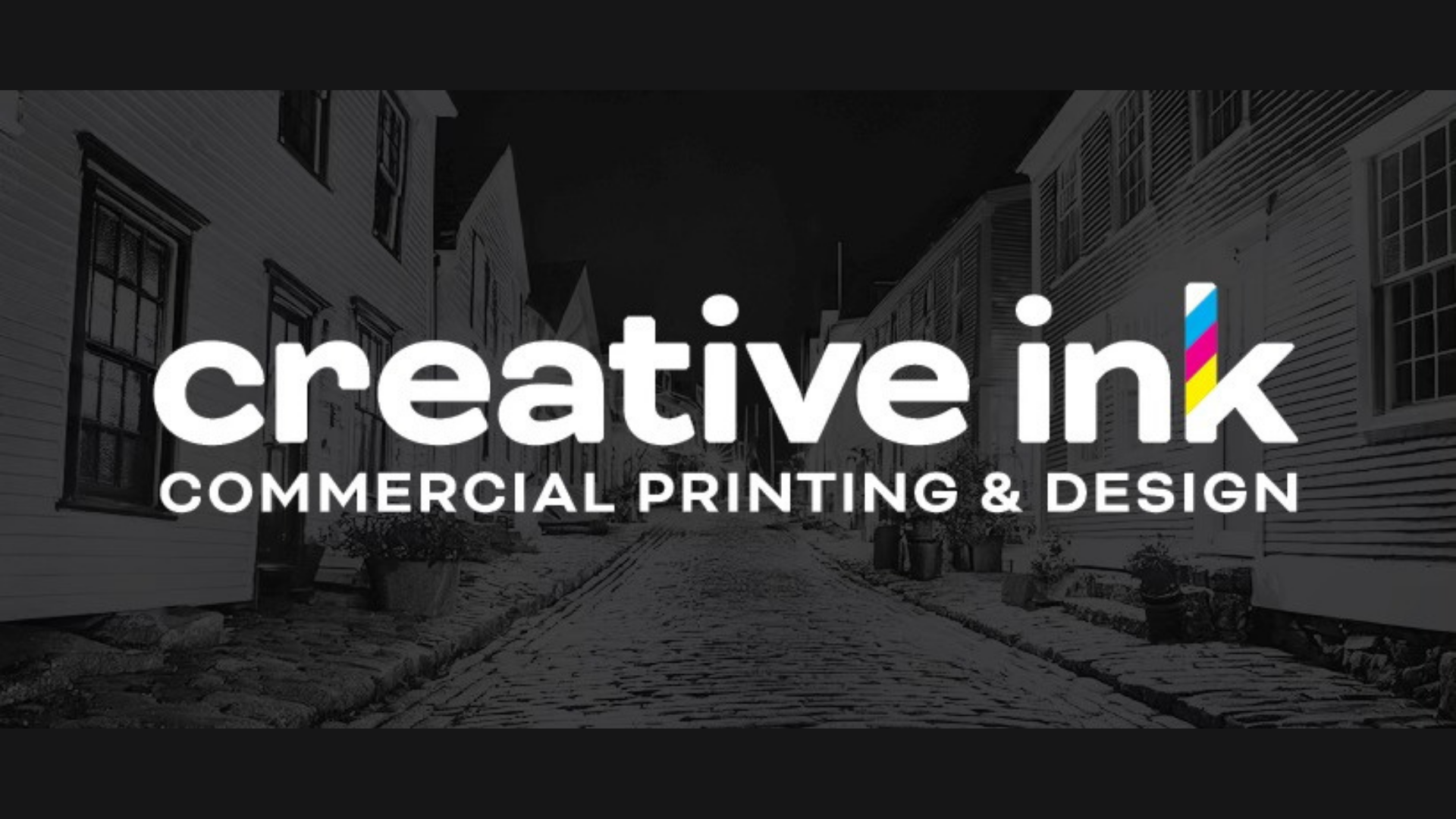 A cobblestone street lined with buildings in grayscale. Overlaid text reads “creative ink COMMERCIAL PRINTING & DESIGN”—the "i" in "ink" features cyan, magenta, yellow, and black color bars. Meet the Member: Salem Summer Jam Inc.