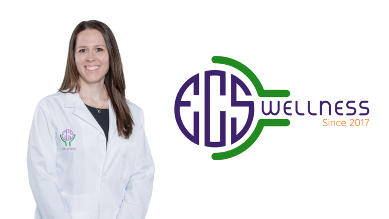 A woman wearing a white lab coat with the ECS Wellness logo stands next to a large EOS Wellness logo and the text “Since 2017” on a white background.