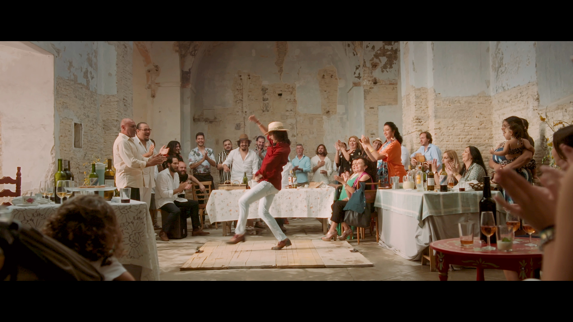 Community members cheer and clap as a dancer fills the rustic Salem Film Fest 2026 room with energy, creativity, and local spirit.