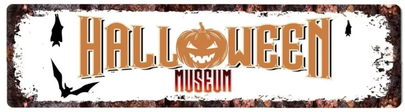 A lively Halloween Museum sign bursting with bold orange-red letters, a pumpkin “O,” and playful black bats—a festive Essex County icon.
