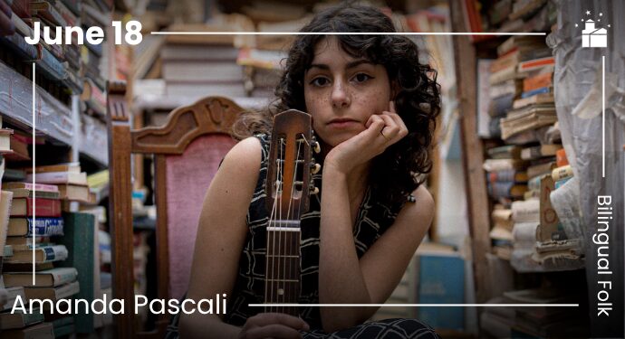 A young woman with curly hair sits in a chair holding a guitar, surrounded by tall shelves filled with books. Text on the image reads "June 18," "Amanda Pascali," and "Bilingual Folk.